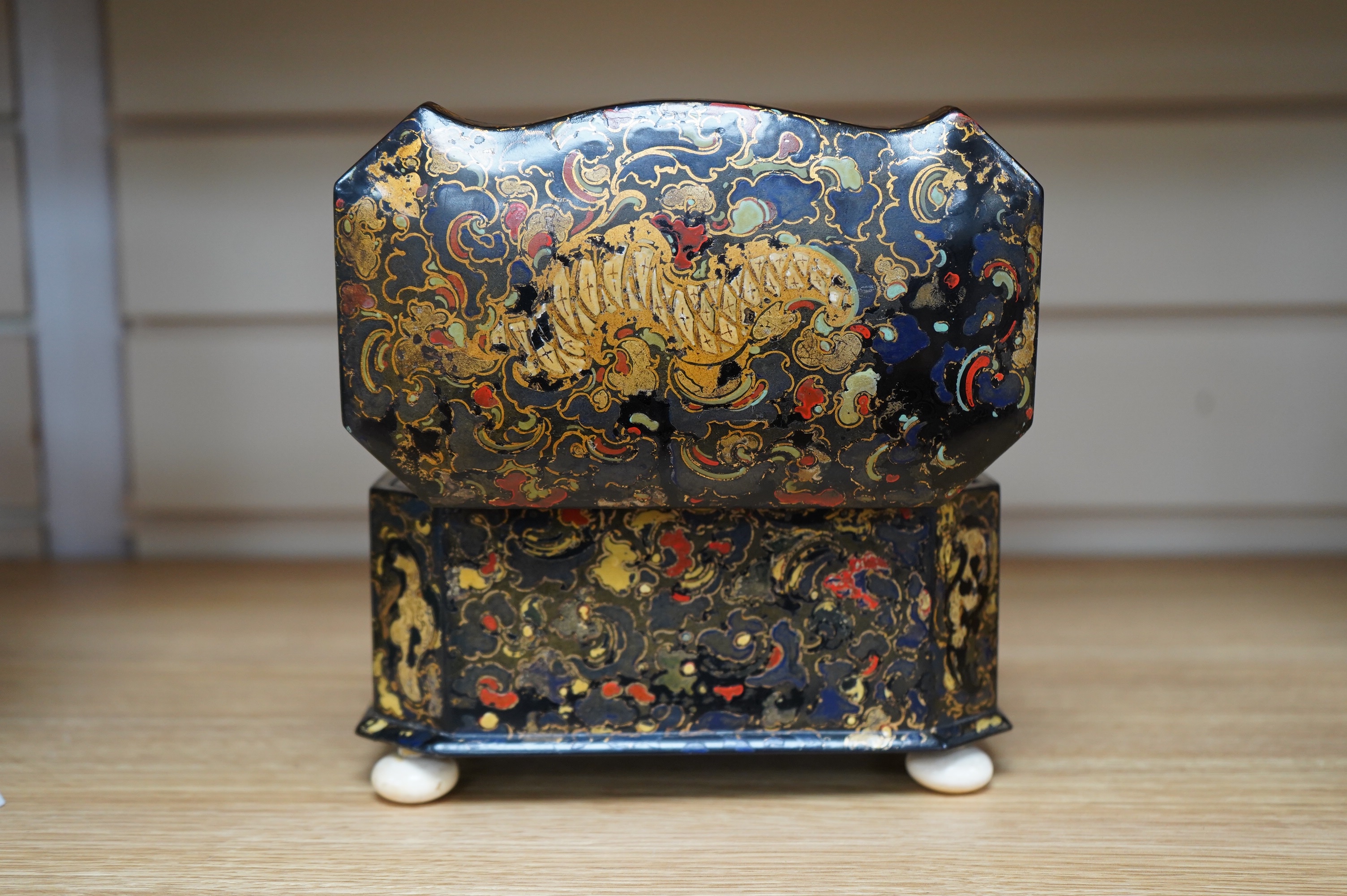 A Victorian Jennens & Bettridge papier mache tea caddy, stamped mark, 20cm wide. CITES Submission reference MB3GJPPY. Condition - fair to good (repaired hinge area)